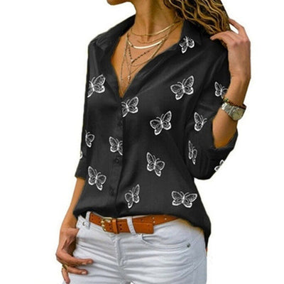 Neleia – Losvallende blouse met vlinderprint